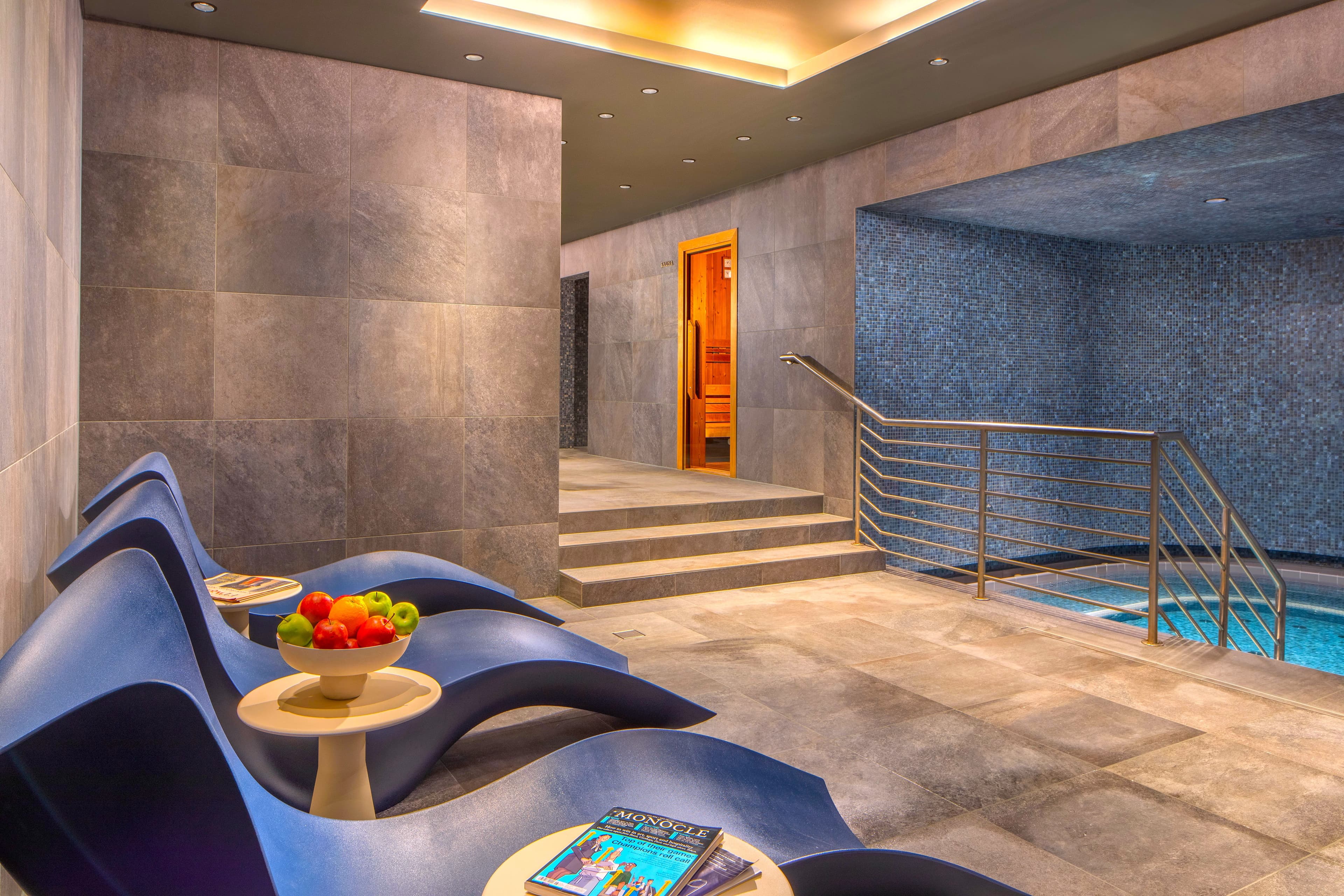 Relaxing area and our large hot tub in the Wellness