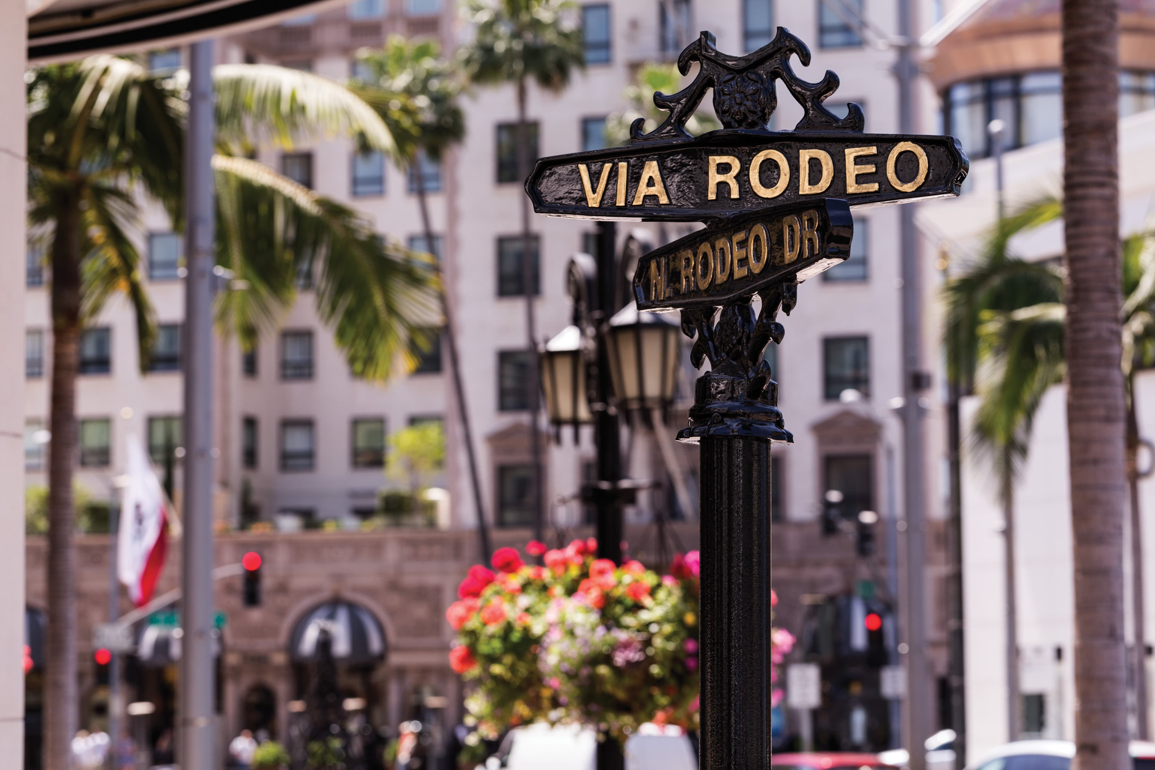 Rodeo Drive Sign With Beverly Wilshire, A Four Seasons Hotel in The Background