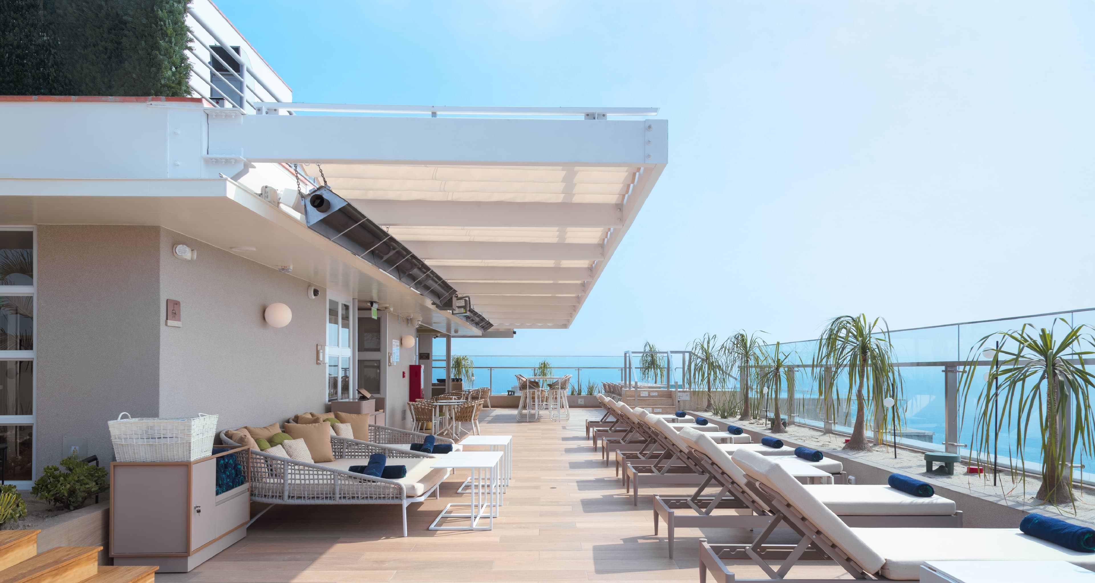 Relax above it all-rooftop pool, endless ocean views, pure bliss.