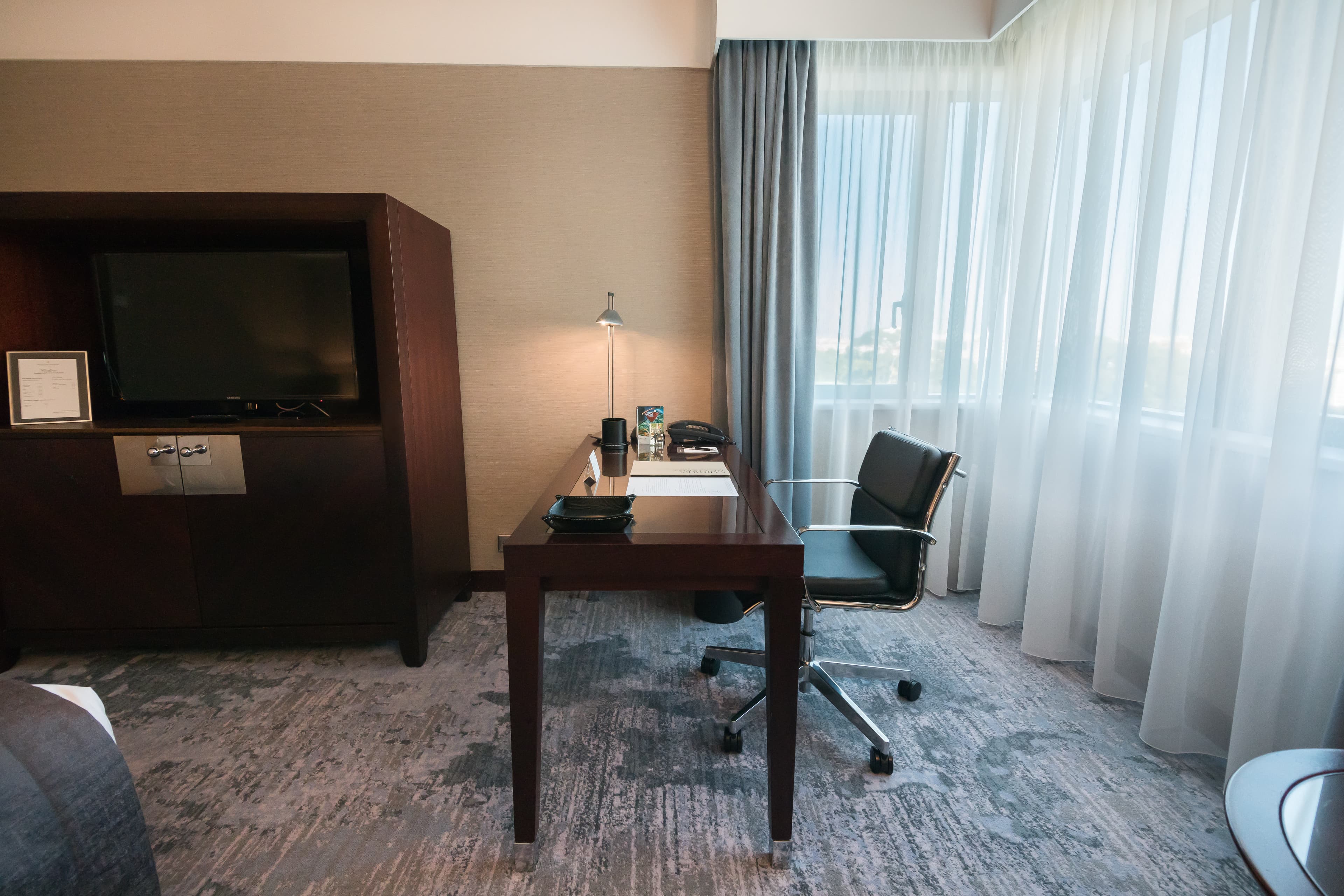 Your Deluxe contemporary room is furnished with large working desk