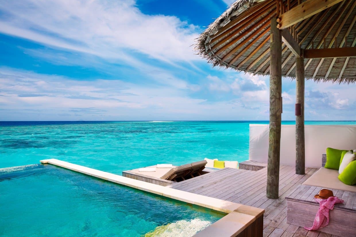 Outdoor relaxing platform with day beds and sun lounges
